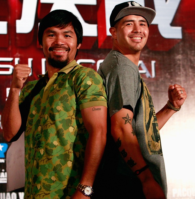 Filipino boxer Manny Pacquiao (left) and Brandon Rios of the US