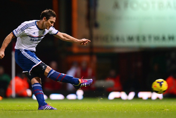 Frank Lampard of Chelsea scores the opening goal from the penalty spot