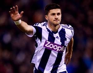 Shane Long of West Bromwich Albion celebrates as he scores their first goal