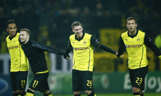Borussia Dortmund's players celebrate after the match