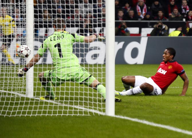 Manchester United's Antonio Valencia scores a goal past Bayer Leverkusen goalkeeper Bernd Leno 