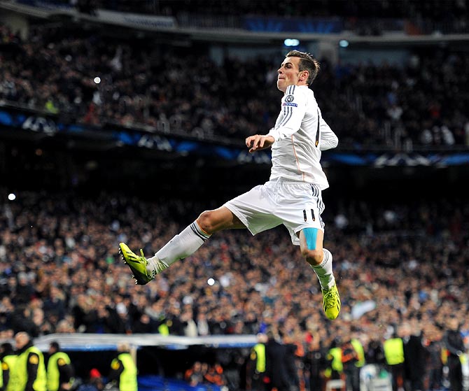 Gareth Bale celebrates scoring the opening goal for Real Madrid
