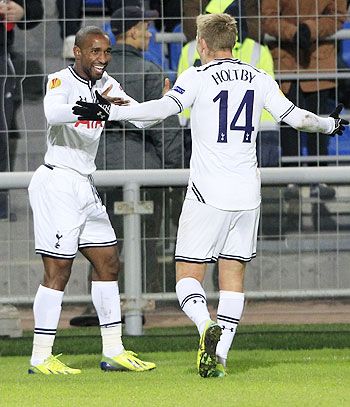 Tottenham Hotspur's Lewis Holtby (right) and Jermain Defoe celebrate a goal scored against Anzhi Makhachkala on Thursday