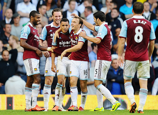 Ravel Morrison of West Ham (3rd from left) is congratulated by teammates after scoring against Tottenham Hotspur during the Barclays Premier League match at White Hart Lane in London on Sunday