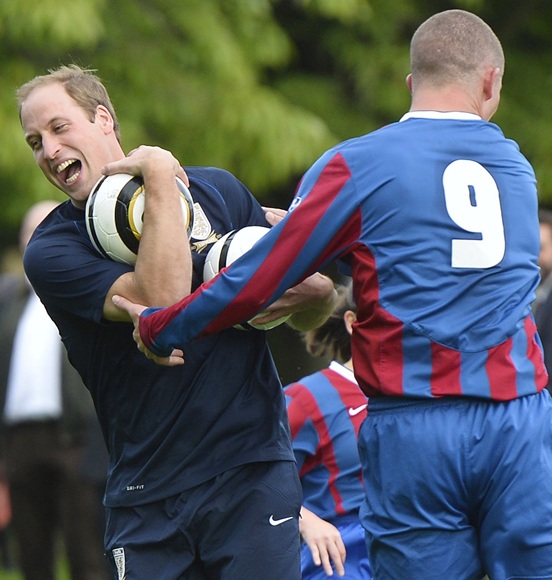Prince William, Duke of Cambridge trains with players in the   grounds of Buckingham Palace to mark the Football Association's 150th anniversary