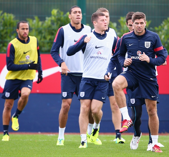 Steven Gerrard of England leads his team-mates during an England Training session