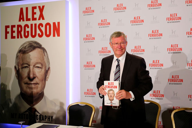 Sir Alex Ferguson poses during a press conference ahead of the publication of his autobiography