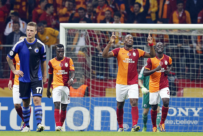 Didier Drogba of Galatasaray (2nd from right) celebrates his goal against FC Copenhagen during their Champions League soccer match in Istanbul on Wednesday
