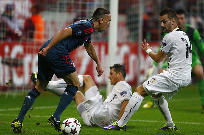 Bayern Munich's Franck Ribery (left) challenges Viktoria Plzen's Radim Reznik during their Champions League match in Munich on Wednesday