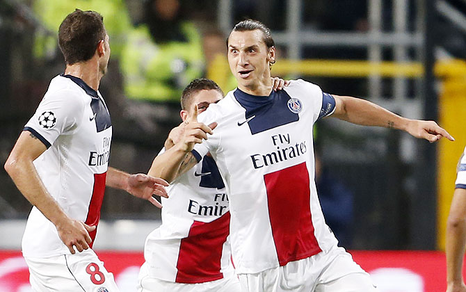Paris Saint-Germain's Zlatan Ibrahimovic (right) celebrates after scoring against Anderlecht during their Champions League match at Constant Vanden Stock stadium in Brussels on Wednesday