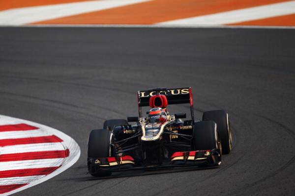 Kimi Raikkonen of Finland and Lotus drives during practice on Friday