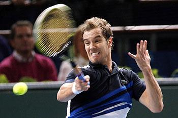 Richard Gasquet of France returns a shot to Fernando Verdasco of Spain at the Paris Masters men's singles tennis tournament on Tuesday