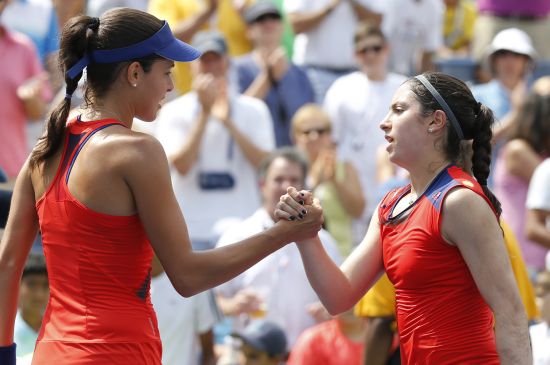 Ana Ivanovic (L) of Serbia is congratulated by Christina McHale of the U.S. after her victory