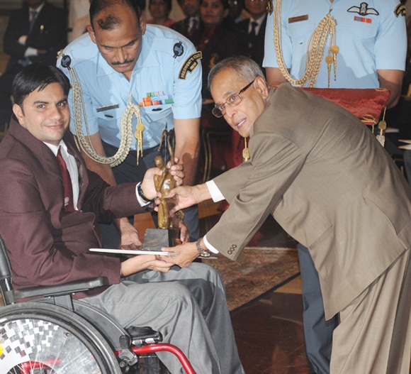 The President, Pranab Mukherjee presents the Arjuna Award to Amit Kumar Saroha for Athletics (Para)