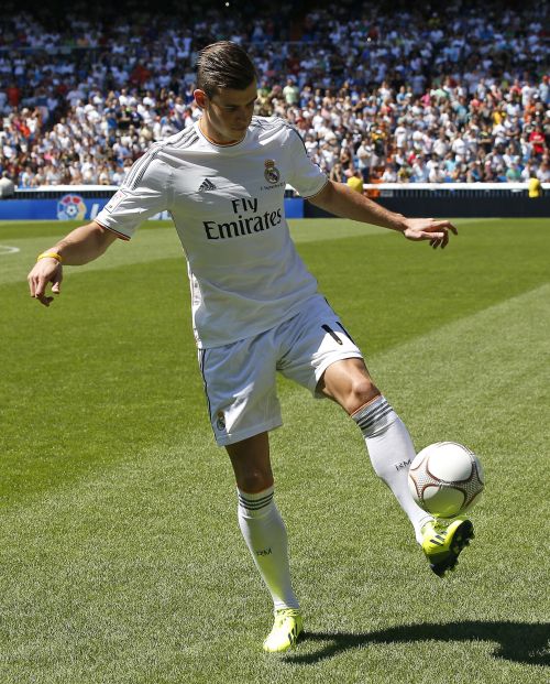 Gareth Bale of Wales kicks a ball at the Santiago Bernabeu stadium