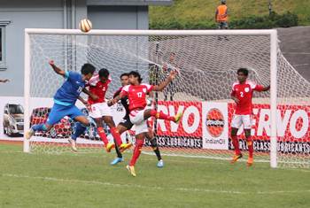 Gouramangi Singh head over the Bangladesh crossbar