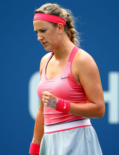 Victoria Azarenka of Belarus reacts during her fourth round match against Ana Ivanovic of Serbia