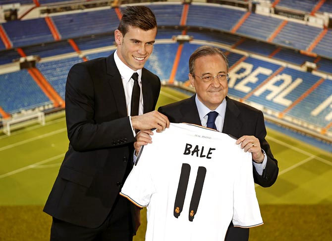 Gareth Bale (left) with Real Madrid president Florentino Perez