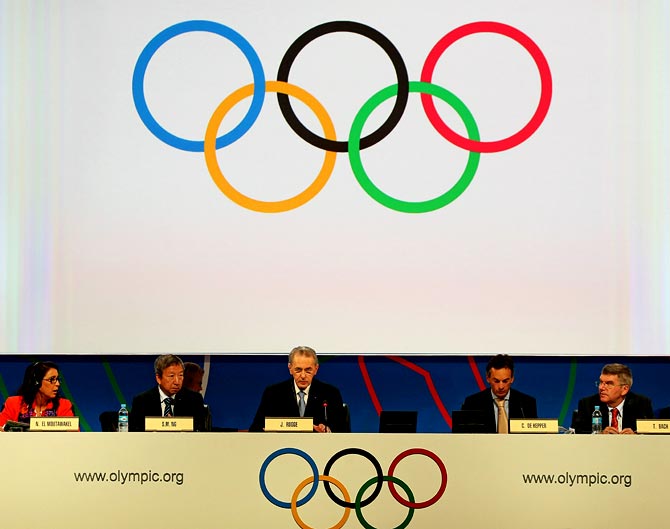 IOC president Jacques Rogge (centre) makes his opening remarks during the 125th IOC session in Buenos Aires