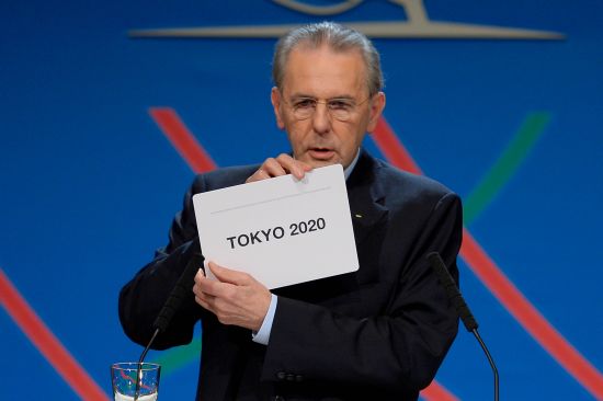 International Olympic Committee (IOC) President Jacques Rogge shows the name of the city of Tokyo elected to host the 2020 Summer Olympics