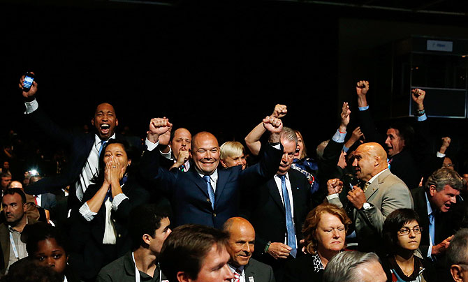 International Federation of Associated Wrestling Styles (FILA) delegation celebrate as   their sport is voted to be included in the 2020 Summer Olympic Games during the 125th IOC   Session - New Sport Announcement in Buenos Aires, Argentina, on Sunday