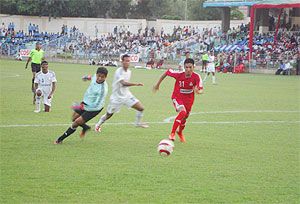 An Army Red player beats Pune FC's 'keeper to score on Monday