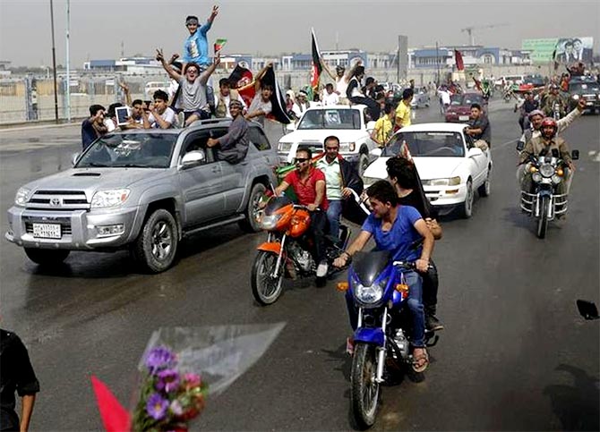 Afghan football fans celebrate winning the South Asian Football Federation championship, in Kabul
