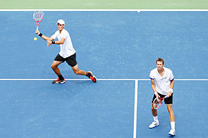 Daniel Nestor (right) and Vasek Pospisil of Canada in action