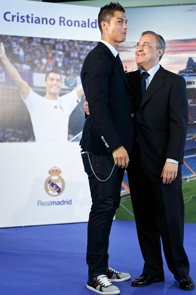 Cristiano Ronaldo (left) stands alongside Real Madrid president Florentino Perez