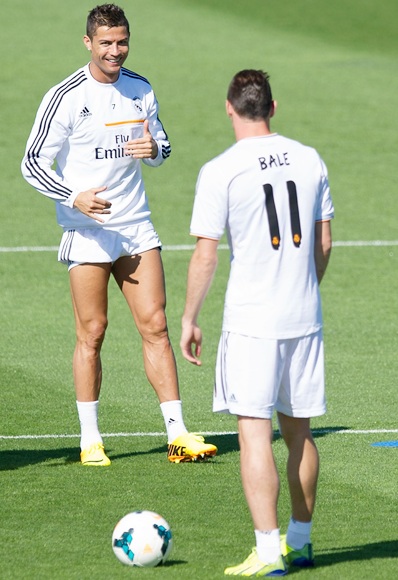 Cristiano Ronaldo chats with Real's new signing Gareth Bale