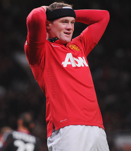 Wayne Rooney of Manchester United reacts during the UEFA Champions League Group A match against Bayer Leverkusen at Old Trafford