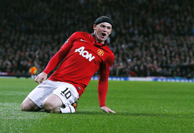 Manchester United's Wayne Rooney celebrates scoring against Bayer Leverkusen