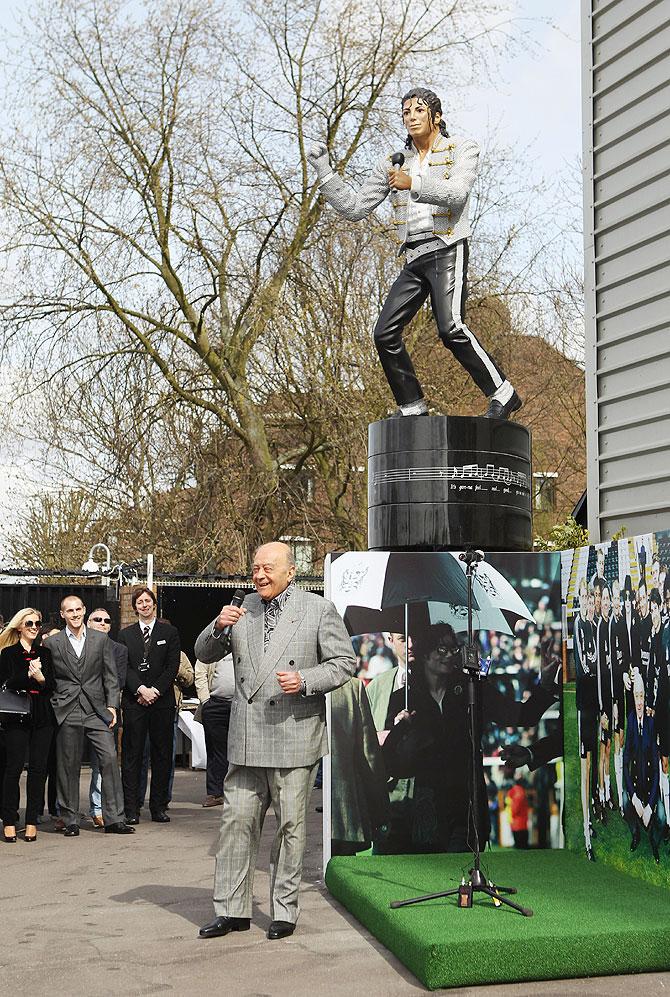 Former Fulham chairman Mohamed Al Fayed unveils a statue in tribute to Michael Jackson at Craven Cottage on April 3, 2011