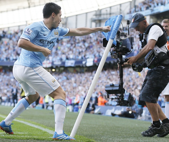 Manchester City's Samir Nasri celebrates scoring against Manchester United