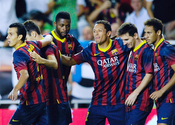Pedro Rodriguez (left) of FC Barcelona celebrates with his team-mates after scoring his team's second goal