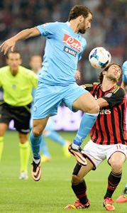 Roma win derby at last, Napoli sink Milan