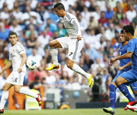 Real Madrid's Cristiano Ronaldo kicks the ball
