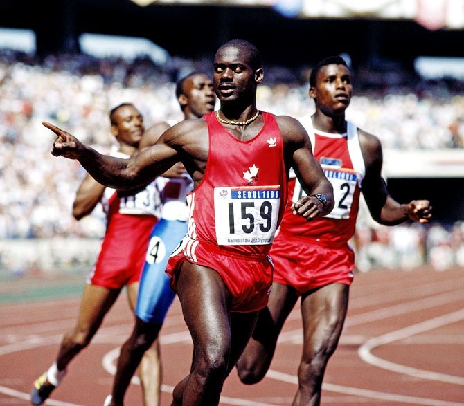 Ben Johnson celebrates winning the gold in the men's 100 metres at the Seoul Olympic Games on September 24, 1988