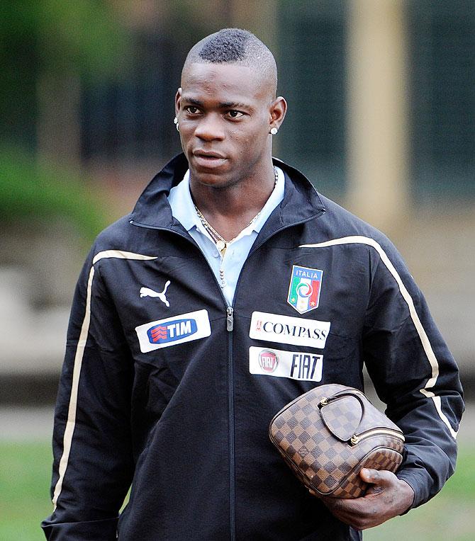 Mario Balotelli arrives for a training session with Italy's national squad