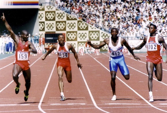 Ben Johnson of Canada (left) leads Calvin Smith of the US (second left), Linford Christie of Britain (second right) and Carl Lewis of the US (right)