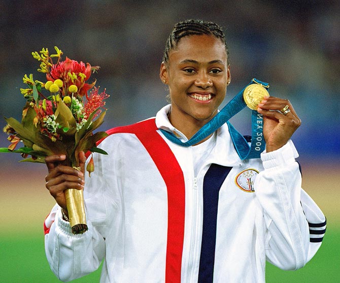 Marion Jones on the podium after winning gold in the 200 metres final at the Olympic Stadium in Sydney, on September 8, 2000.
