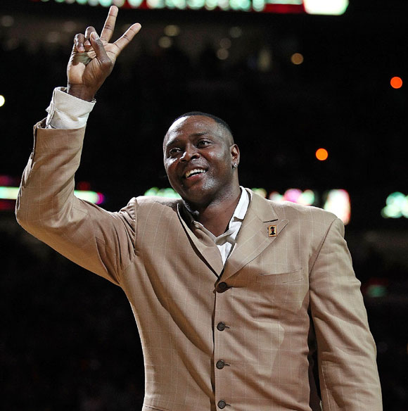 Former player Horace Grant of the Chicago Bulls waves to the crowd