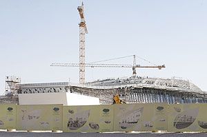 Labourers work at the construction site of Qatar Foundation headquarters in Doha in preparation for the 2022 Football World  Cup in Qatar