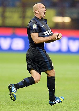 Esteban Cambiasso of Inter Milan celebrates scoring the first goal against Fiorentina at Giuseppe Meazza Stadium in Milan on Thursday