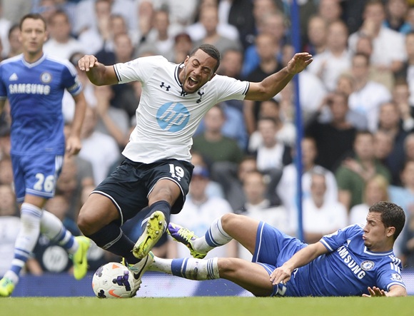 Tottenham Hotspur's Moussa Dembele (left) is challenged by Chelsea's Eden Hazard