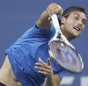 Unheralded Joao Sousa completed a fairytale run at the Malaysian Open on Sunday when he beat France's Julien Benneteau 2-6, 7-5, 6-4 in the final to become the first Portuguese to win an ATP Tour title.