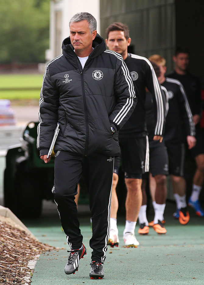 Jose Mourinho of Chelsea arrives for a training session