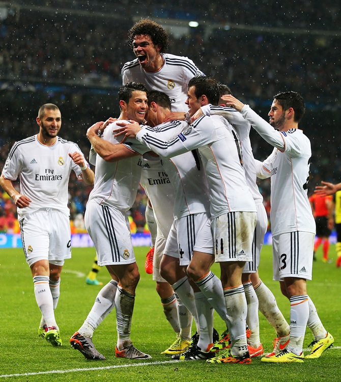 Cristiano Ronaldo of Real Madrid celebrates scoring his goal with teammates