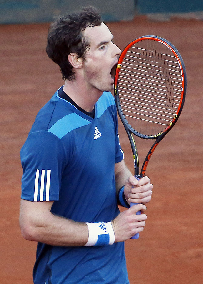 Britain's Andy Murray reacts during his Davis Cup quarter-final tennis match against Italy's Andreas Seppi in Naples on Friday