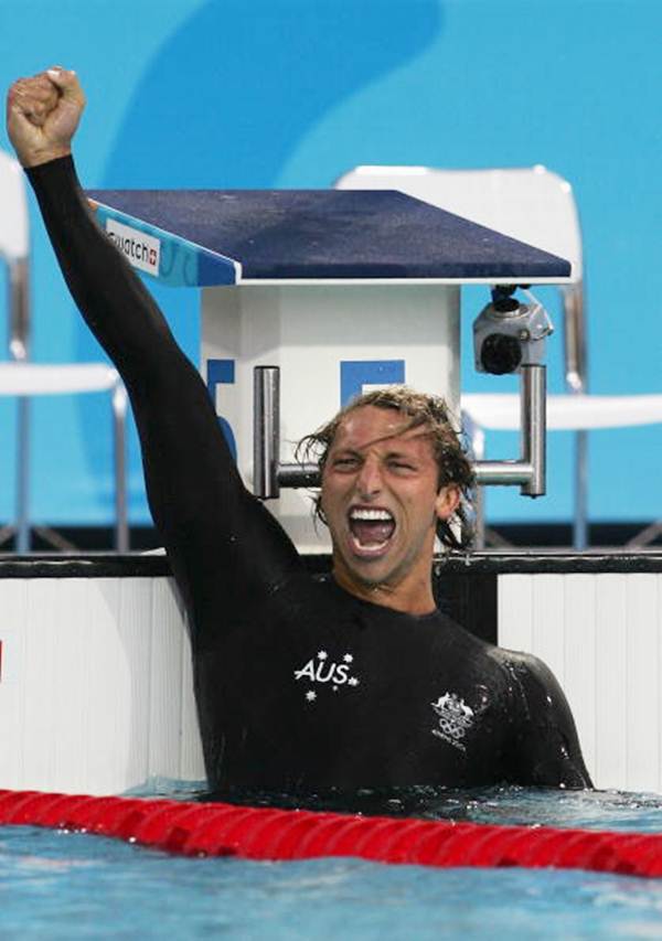 Ian Thorpe celebrates after winning the men's swimming 200 metre freestyle final on August 16, 2004 during the Athens 2004 Summer Olympic Games at the Main Pool of the Olympic Sports Complex Aquatic Centre